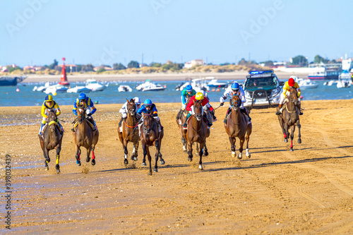 Horse race on Sanlucar of Barrameda, Spain photo