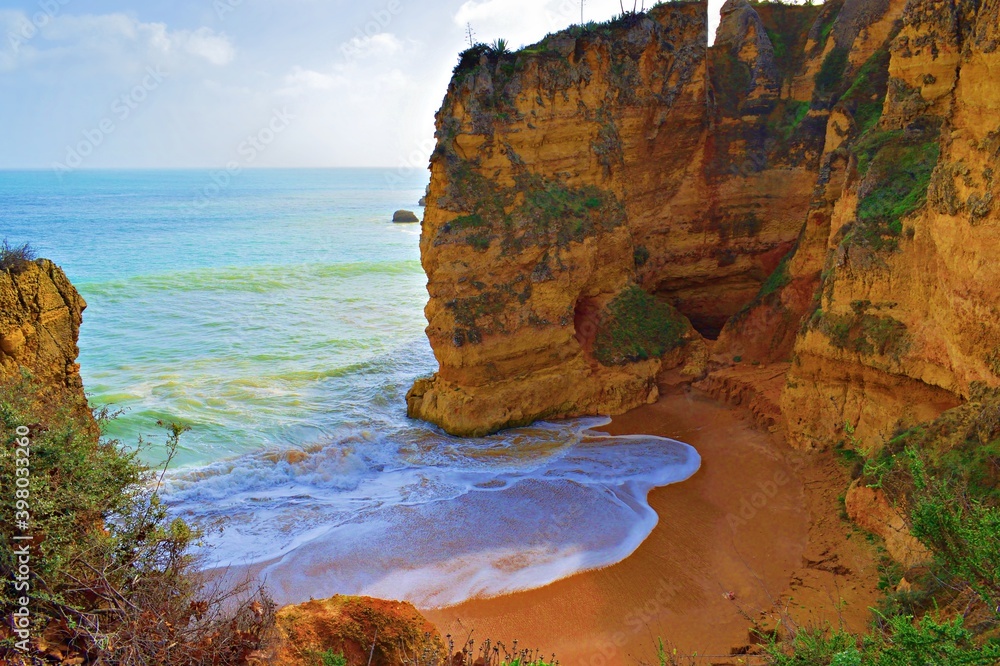 landscape of the beautiful Praia da Dona Ana beach located in Lagos in the Algarve region in southern Portugal on the Atlantic Ocean