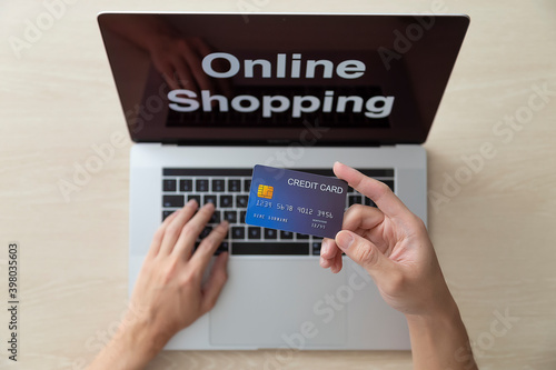 using laptop and credit card online shopping