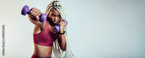 Woman training on punching exercises