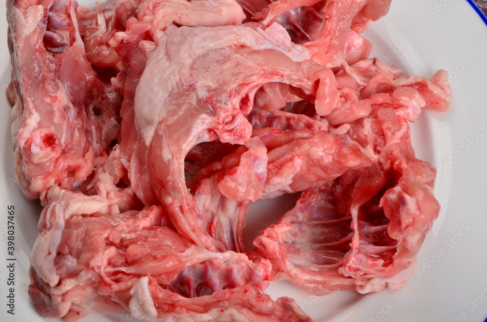 Raw Chicken bones for soup and chicken broth. Fresh chicken skeleton. Chicken bone carcass Raw Chicken bones for soup and chicken broth. Fresh chicken skeleton. Chicken bone carcass