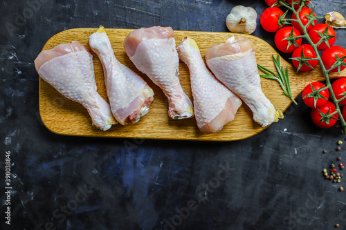 raw chicken drumsticks meat for cooking on the table healthy meal snack top view copy space for text food background rustic 