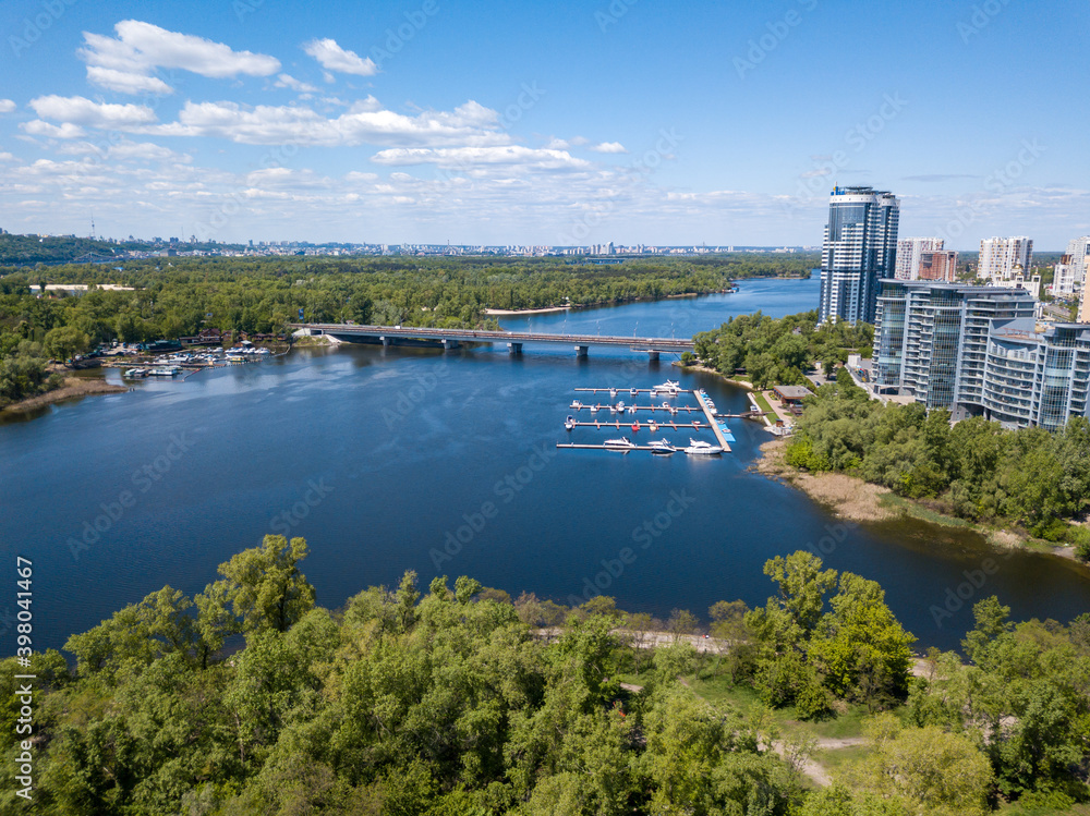 Fototapeta premium Aerial drone view. Dnieper river in Kiev on a sunny day.