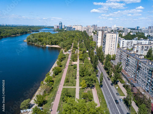 Aerial drone view. Residential buildings on the bank of the canal on a sunny day in Kiev.
