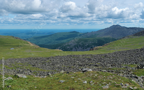 Northern Ural Mountains, Panorama of Iov plateau, Iov ravine and peak of Serebryanskiy Rock Mount, Russia photo