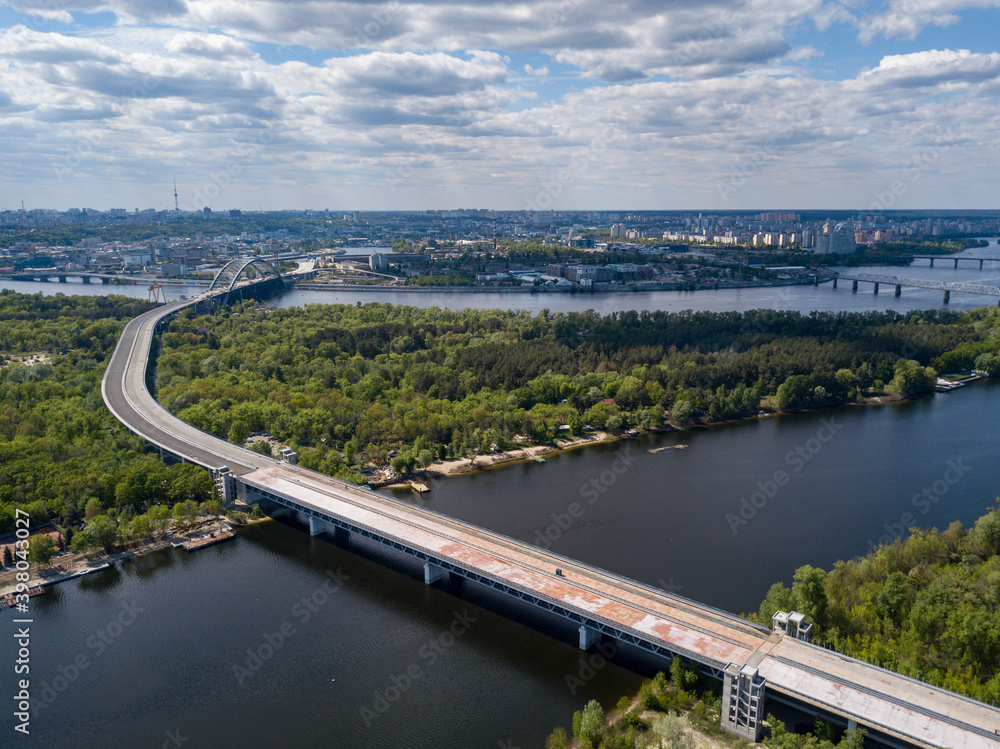 Aerial drone view. Unfinished bridge in Kiev, sunny summer day. Aerial drone view. Unfinished bridge in Kiev, sunny summer day.