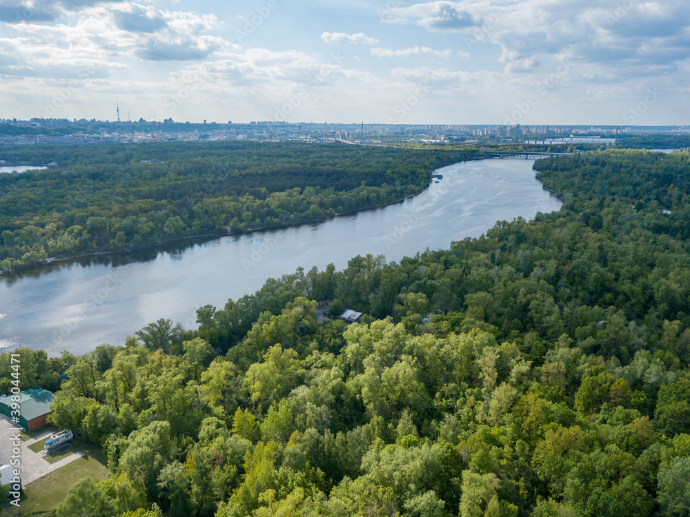 Aerial drone view. Dnieper river in Kiev on a sunny day.