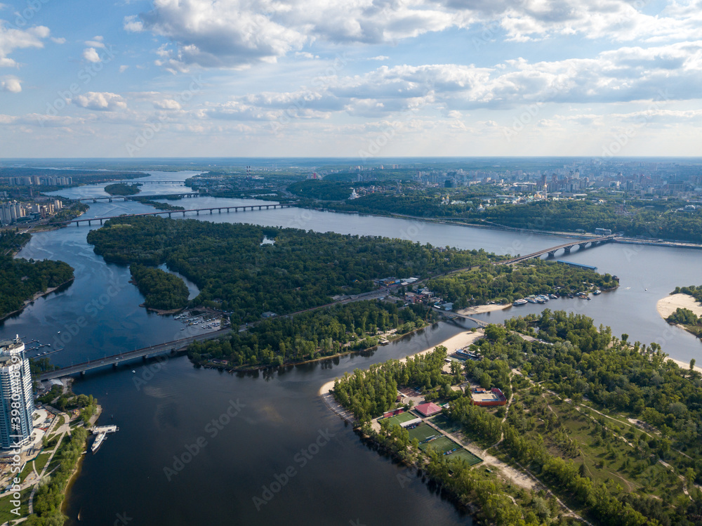 Aerial drone view. Automobile bridge over the Dnieper river in Kiev.