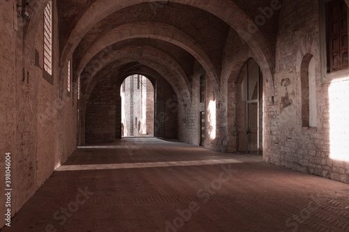 Games of light that filters through the windows inside the Palazzo Ducale in Gubbio  Umbria  Italy  Europe 