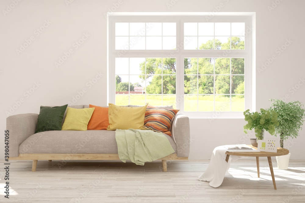Fototapeta premium White living room with sofa and summer landscape in window. Scandinavian interior design. 3D illustration