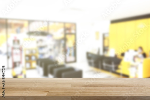 Wallpaper Mural Empty wooden board empty table in front of blurred background. Perspective brown wood over garage background - can be used mockup for display or montage your products. copy space. Torontodigital.ca