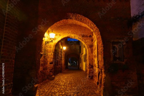 Historisches Stadttor in der Altstadt von Zons bei Nacht photo