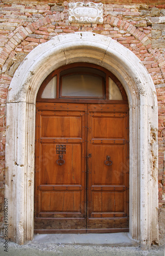 Ancient door in the village of Panicale in Umbria, Italy © Stefano