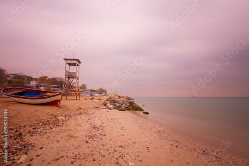 Avcılar on the beach and fishing boats waiting on the sidelines / İstanbul