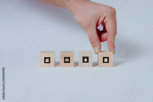 Set of Christmas icons on wooden cubes. White background