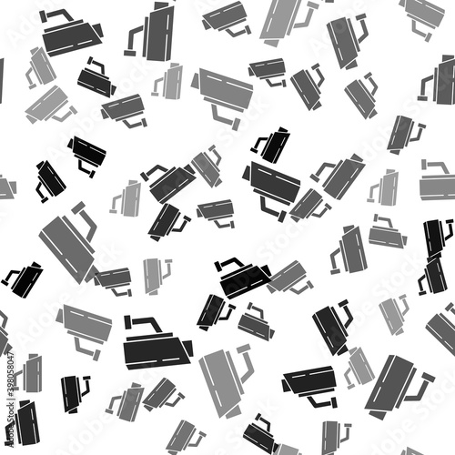 Black Security camera icon isolated seamless pattern on white background. Vector.