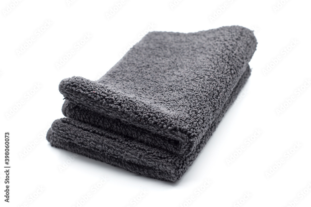Closeup of black bathroom carpet pile on white background Closeup of black bathroom carpet pile on white background