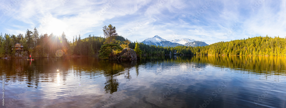 Beautiful Peaceful Panoramic View of Levette Lake with famous Tantalus Mountain Range in the background. Taken in Squamish, North of Vancouver, British Columbia, Canada. Nature Panorama