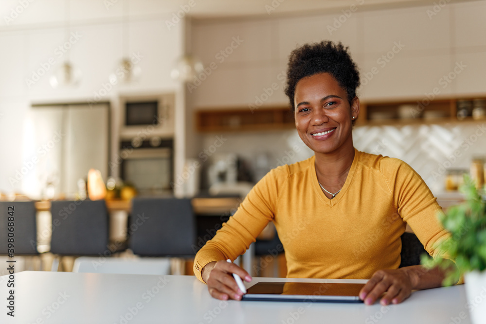 Smiling woman using modern technology. Smiling woman using modern technology.