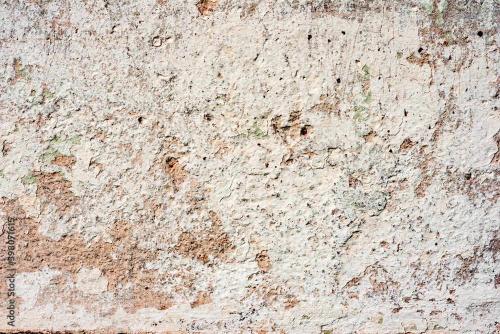 Texture of a concrete wall with cracks and scratches which can be used as a background Texture of a concrete wall with cracks and scratches which can be used as a background