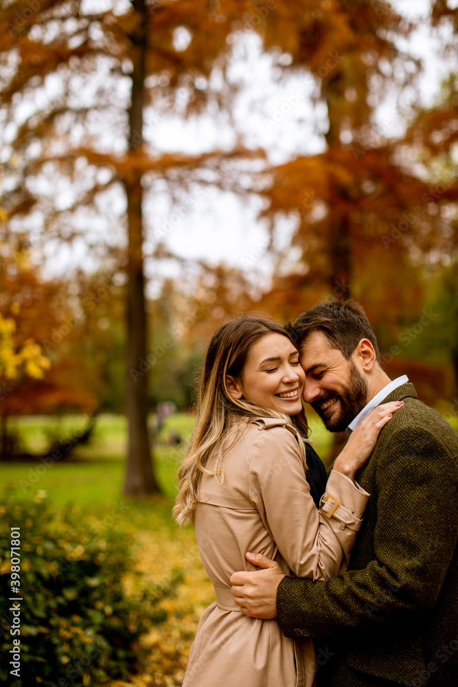 Young couple in the autumn park