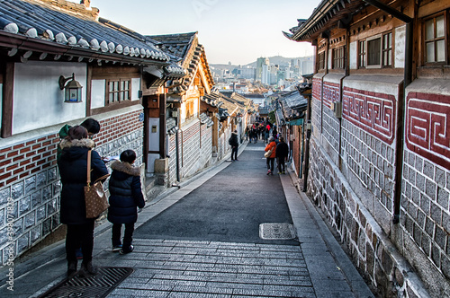 Photography Bukchon Hanok Village is a Korean traditional village, The traditional village is composed of lots of alleys, hanok and is preserved to show a 600-year-old urban environment