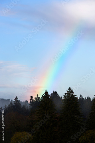 Landscape of Bavarian mountains with rainbow