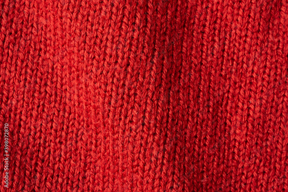 Red knitted wool texture background Red knitted wool texture background