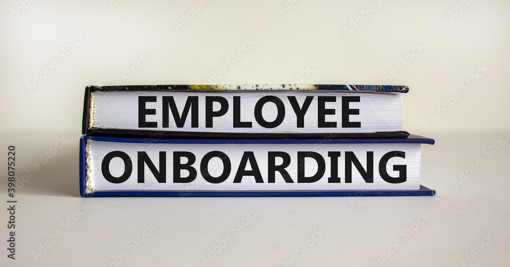 Employee onboarding symbol. Books with text 'employee onboarding' on ...