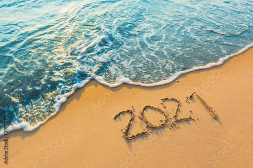 new year's eve welcome new year Goodbye 2021 on the beach on nature background © photosky99
