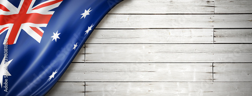 Australian flag on old white wall banner