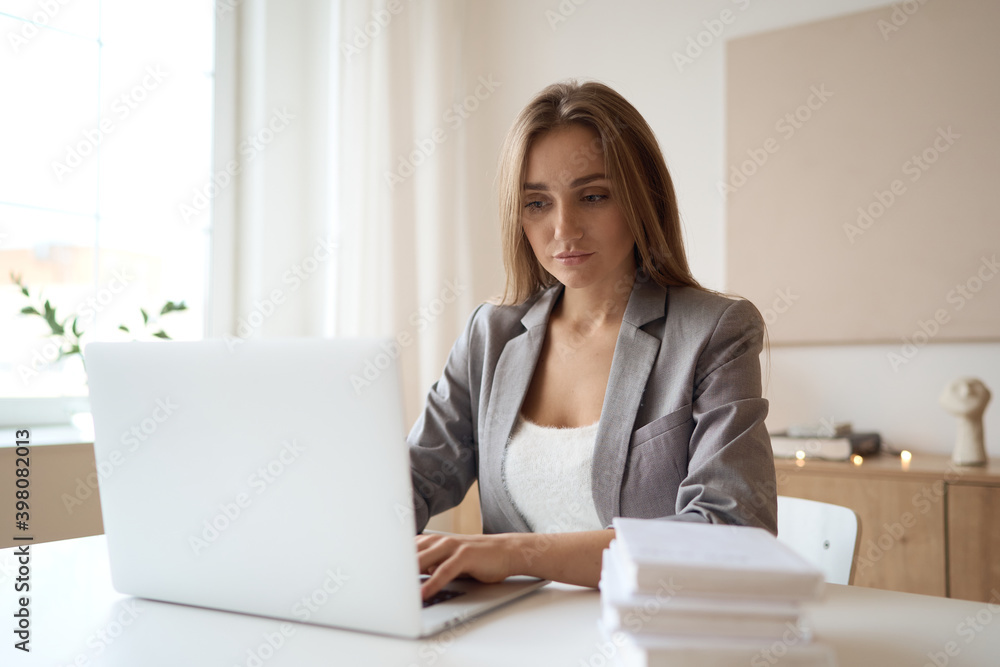 Beauitul young woman working using computer laptop concentrated. High quality photo Beauitul young woman working using computer laptop concentrated. High quality photo
