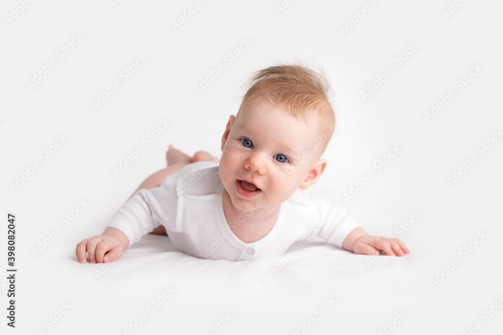 small baby in white clothes on light background small baby in white clothes on light background