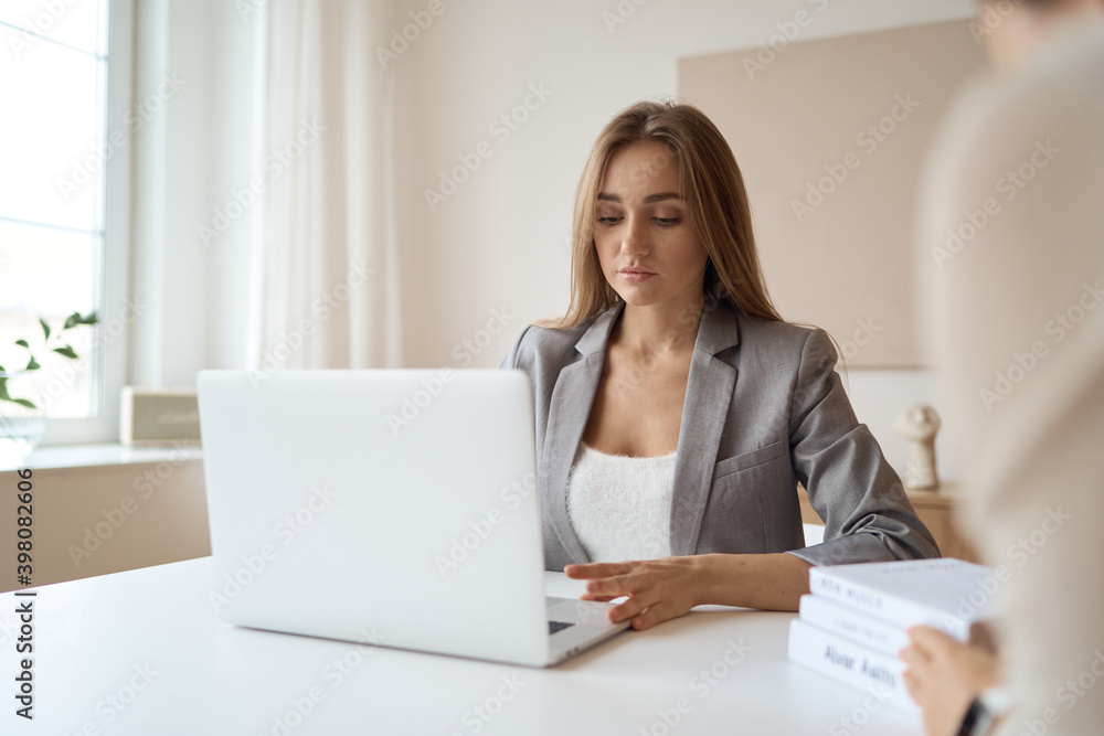 Beauitul young woman working using computer laptop concentrated. High quality photo Beauitul young woman working using computer laptop concentrated. High quality photo