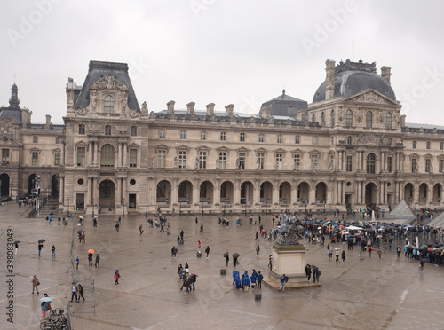   View from the second floor of the Louvre to the rainy Place du Carrousel