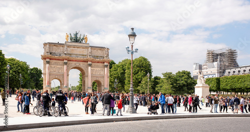  Place Carrousel, Louvre. Tourists walk and take pictures