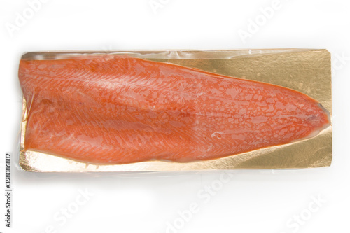 Fillet of red fish in vacuum packing. Isolate. Horizontal format. View from above. Copyspace