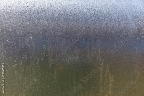 Glass texture covered with dew drops