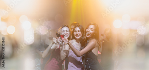 Party asian girl holidays celebrate nightlife. group of young girl happy dancing party hand holding a drink. lifestyle women young asian enjoyment nightclub.