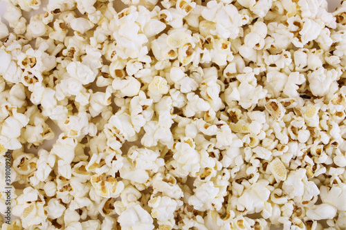 Fresh popcorn background. Popcorn texture. Corn snacks close up.