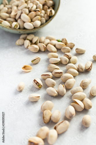Pistachios. A scattering of pistachios on the table. Shallow depth of field, selective focus