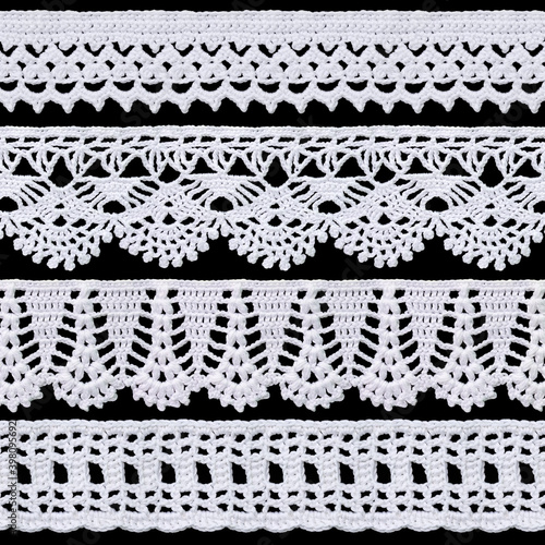 Set of white tape lace on a black background. Vintage style. Material for stylish graphic decoration.