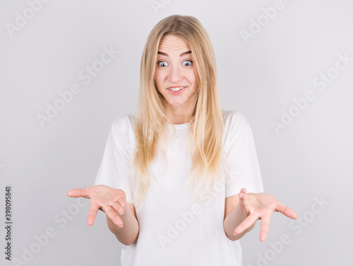 Portrait of nice-looking cute attractive lovely girl showing I don't know gesture isolated over white background