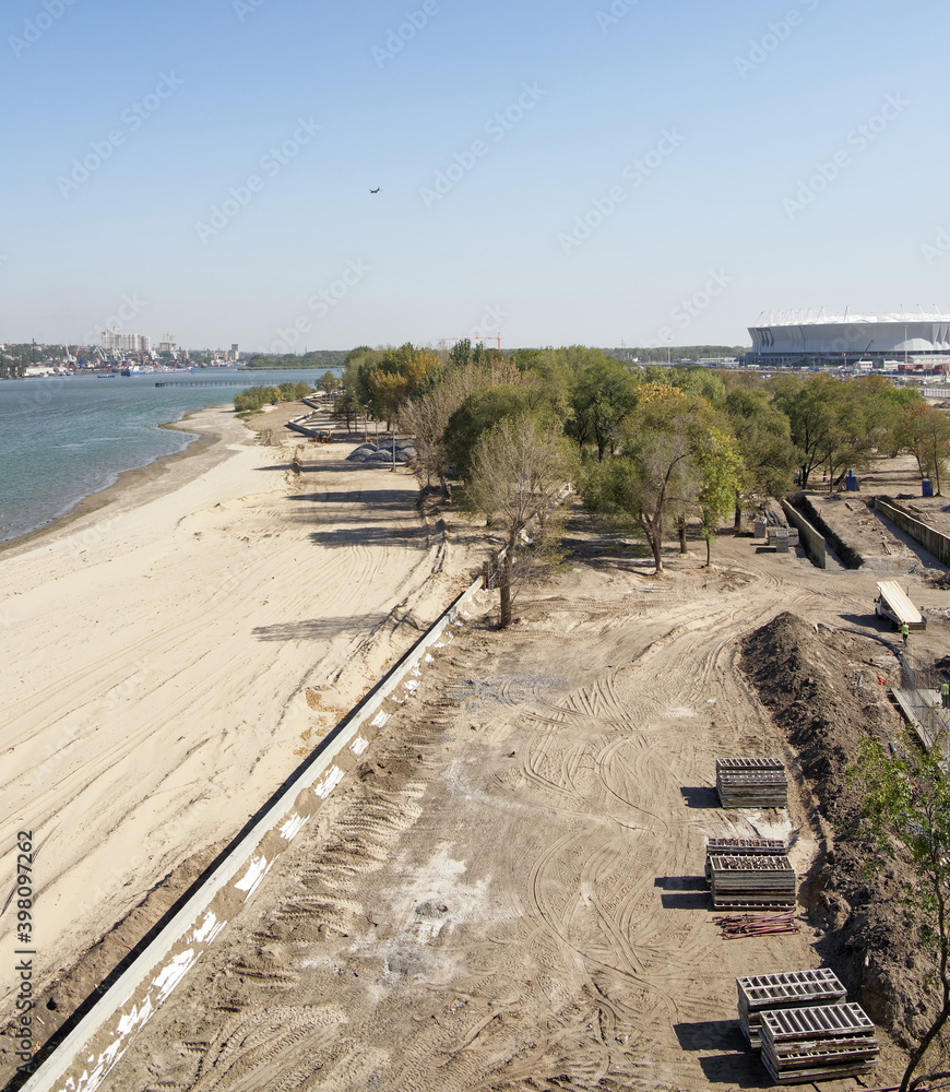  Construction of a new beach for the 2018 FIFA World Cup.New stadium is visible