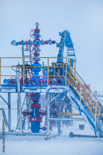 Overhaul of gas wells, coiled tubing installation, Gas-hole spot preventer. Oil, gas industry. Group wellheads and valve armature , Gas valve, Gas well of high pressure, shooting in the snow photo