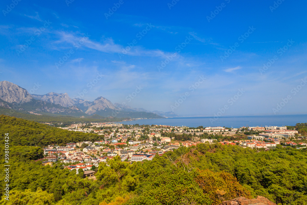 Fototapeta premium View of Kemer town on a coast of the Mediterranean sea in Antalya province, Turkey. Turkish Riviera. View from a mountain