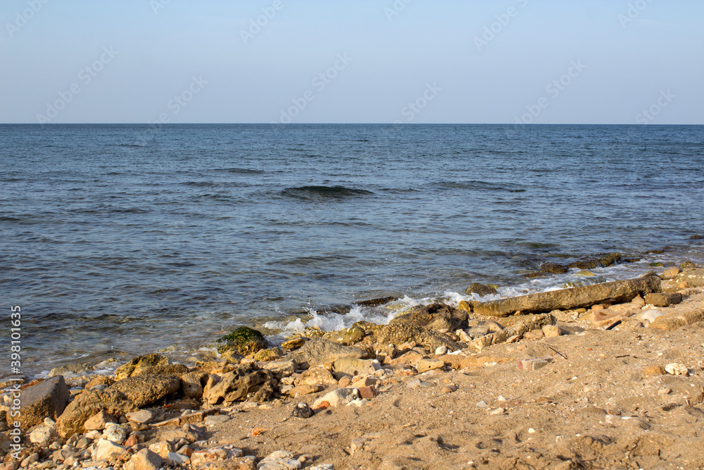 Beautiful empty beach. Seascape  with clear sky and tranquil water. Winter in Middle East. 