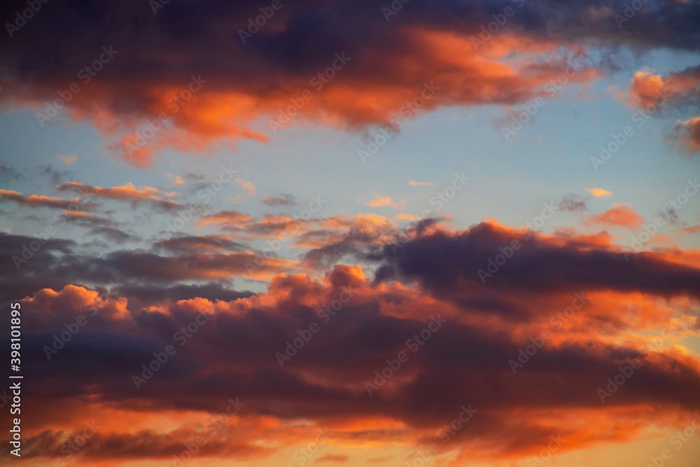 Sunset, sunrise with clouds, light rays and other atmospheric effect. Mystic dramatic sky with clouds.
