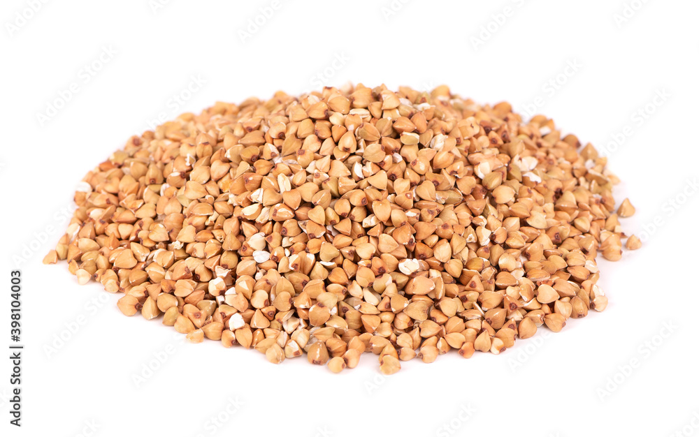 Buckwheat groats isolated on white background. Green buckwheat seeds. Buckwheat groats isolated on white background. Green buckwheat seeds.