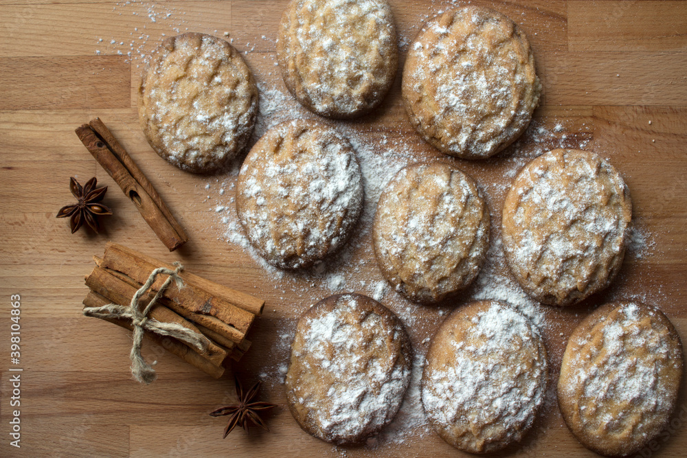 Homemade butter cookies on a table. Top view photo of fresh baked biscuits. Christmas menu ideas.
Homemade butter cookies on a table. Top view photo of fresh baked biscuits. Christmas menu ideas.